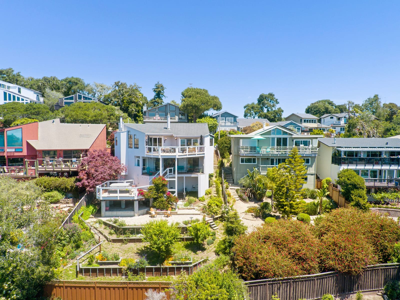 Aerial view of the home and neighboring properties