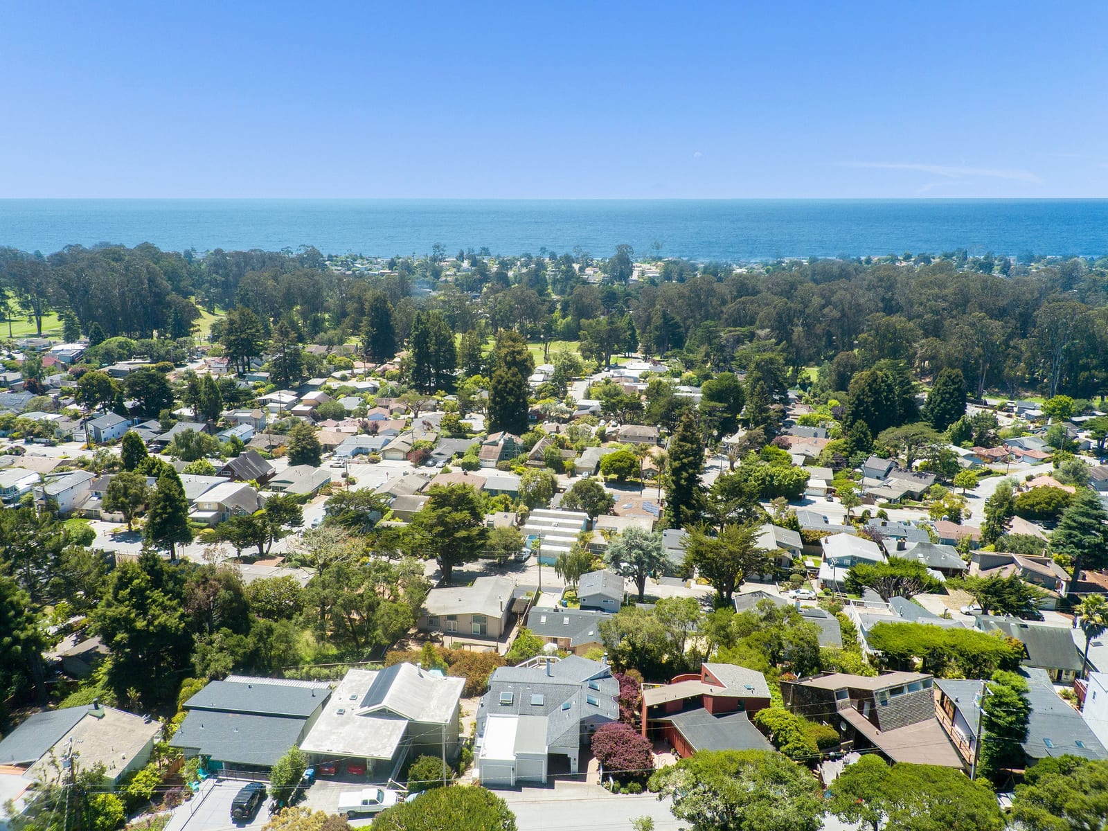 Aerial neighborhood view looking toward Monterey Bay
